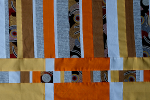 Detail des Quilts Gelbe Streifen